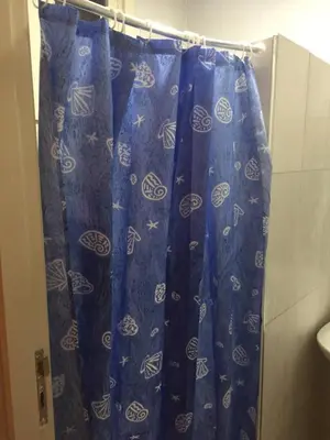 a shower curtain in a bathroom in a room at ocean view apartment in Rabat