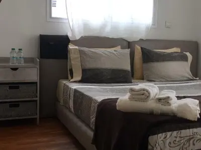 a bedroom with two beds with towels on them at Dior D'Anfa in Casablanca