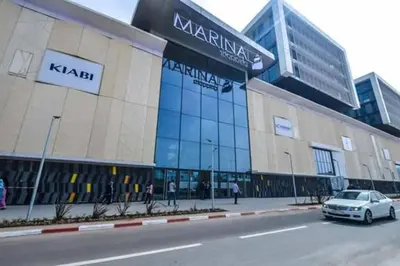 a car parked in front of a large building at Very beautiful apartment with see view 5th in Casablanca
