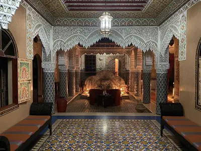 an ornate room with a chandelier in a building at Equi Palace & SPA Near Aeroport in Berrechid