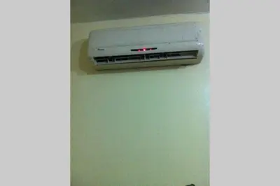 a wall mounted air conditioner on a wall at Nice 2 Bedrooms Apartment near the beach in Rabat