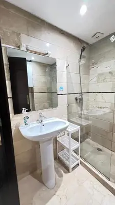 a bathroom with a sink and a shower at Studio de luxe in Casablanca