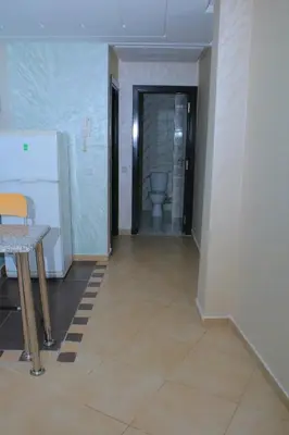 a hallway with a toilet in a room at BOUZNIKA au centre in Bouznika