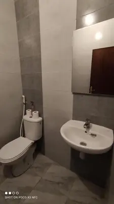 a bathroom with a toilet and a sink at Appartement près de casanearshore et l'OFPPT in Casablanca
