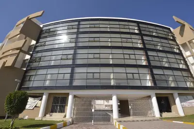 a tall glass building with its doors open at BOUZNIKA Z2 in Bouznika