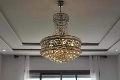 a large chandelier hanging from a ceiling at MOHAMMEDIA piscine et plage in Mohammedia