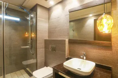 a bathroom with a sink and a shower and a toilet at #26 Maarif urban Massira near twin center casablanca in Casablanca