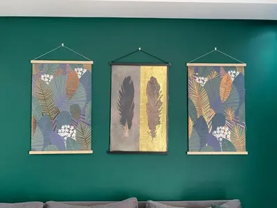 three banners on a green wall with birds and leaves at GREEN HOUSE OVERLOOKING INTERNATIONAL SCHOOL in Casablanca