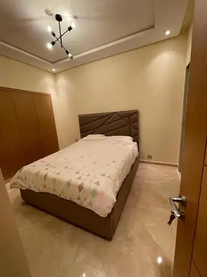 a bedroom with a bed in a room at CASA BAY BEACH OMK in Sidi Rahal