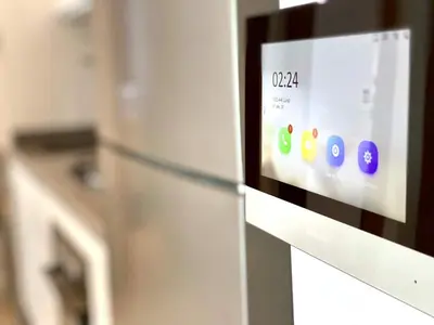 a refrigerator in a kitchen with a screen on it at Anfa Living 23-BREATHTAKING SEA VIEW NEW&CHIC 5 in Casablanca