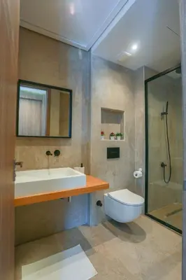 a bathroom with a tub and a sink and a toilet at #34 New Flat in new Garden Residence in Casablanca