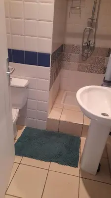 a bathroom with a toilet and a sink at Adarissa House in Rabat