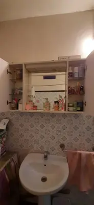 a bathroom with a white sink in a room at Apartment in the center of Casablanca in Roches Noires