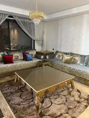 a living room with a couch and a coffee table at Future apartments in Casablanca
