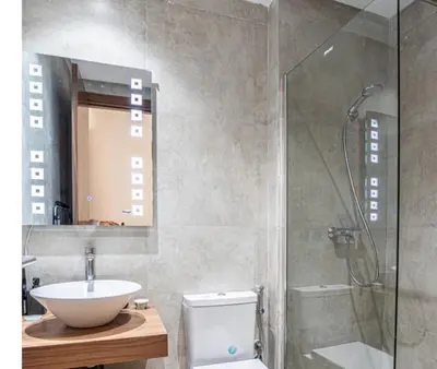 a bathroom with a sink and a shower and a toilet at Havre de paix au cœur de Casa in Casablanca