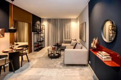 a living room with a couch and a table at Upscale flat with Gym in Casablanca