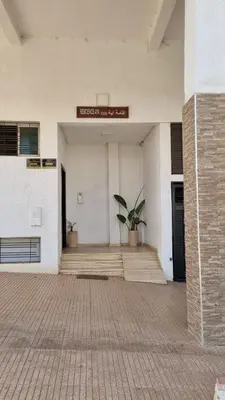 a lobby of a building with a plant in it at My Cosy Place Rabat - Cosy Home Wifak Temara in Temara
