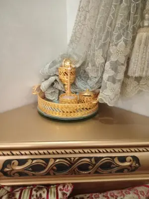 a golden crown on a table next to a curtain at 3 Bedroom Apartment with Wifi in Casablanca