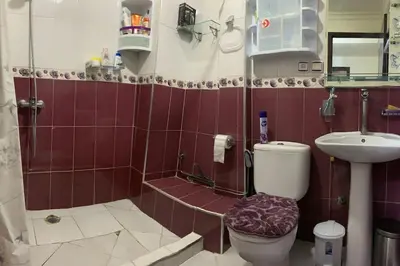 a bathroom with a toilet and a sink at Appt Tranquile et Propre Cozy a petit prix in Casablanca