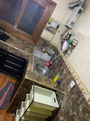 an overhead view of a kitchen with a sink at Appt Tranquile et Propre Cozy a petit prix in Casablanca