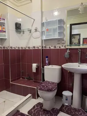 a bathroom with a toilet and a sink at Appt Tranquile et Propre Cozy a petit prix in Casablanca