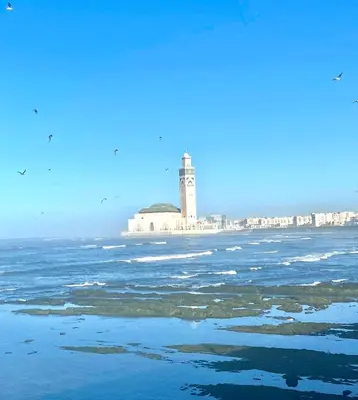 a lighthouse in the middle of a body of water at appartement en plein centre de casablanca in Casablanca