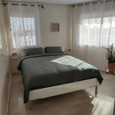 Chaleureux Appartement à 1 min à pied de la Mosquée Hassan II