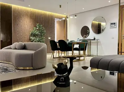 a living room with a couch and a table at Casablanca Marina Ocean View - By AppartAli in Casablanca