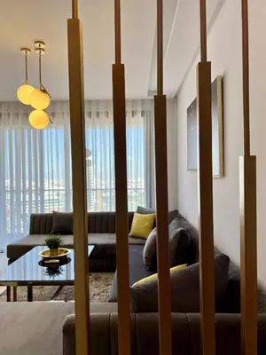 a living room with a couch and a table at Anfa 212 Top Floor - 2 Bedrooms- By AppartAli in Casablanca