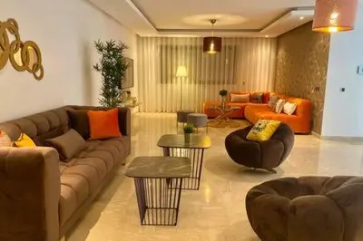 a large living room with a couch and chairs at Maarif Sunset View - 3 Bedrooms - By AppartAli in Casablanca
