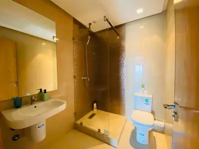 a bathroom with a white toilet and a sink at Maarif Top Floor - 2 Bedrooms - By AppartAli in Casablanca