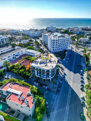 an aerial view of a city with the ocean at Royal Ocean Suite - By Ayla Stay in Casablanca