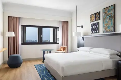 a hotel room with a bed and a table at Casablanca Marriott Hotel in Casablanca