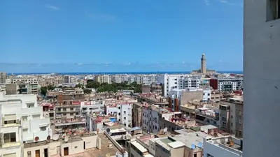 a view of a city from a building at Amazing view overlooking the ocean and Hassan 2 in Casablanca