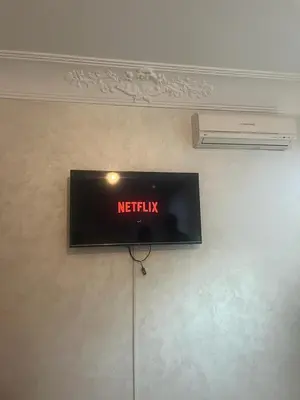 a sign that says netflix on a wall at Appartement avec piscine proche de la plage in Mohammedia