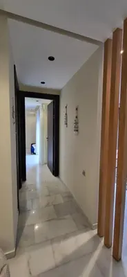 a hallway in a house with a hallway leading to a room at L'Amouage Casablanca Location Journalière Casablanca in Casablanca